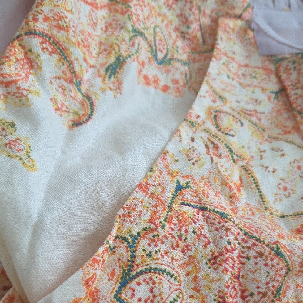 This is a Free People Blooming Fields wide-legged jumpsuit with a paisley bohemi - Picture 10 of 10